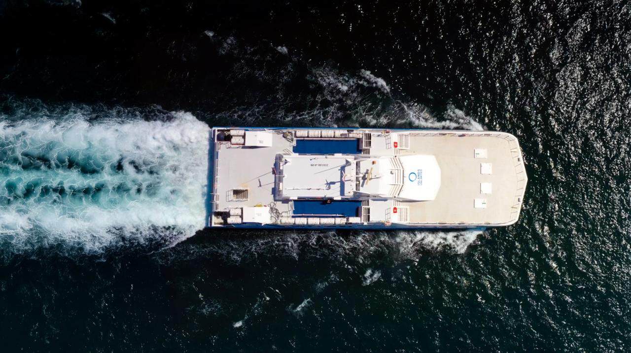 Fast boat cruising through open waters, showcasing island exploration.