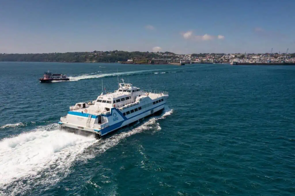 Ferry boat cruising across the water in Islands Unlimited service.